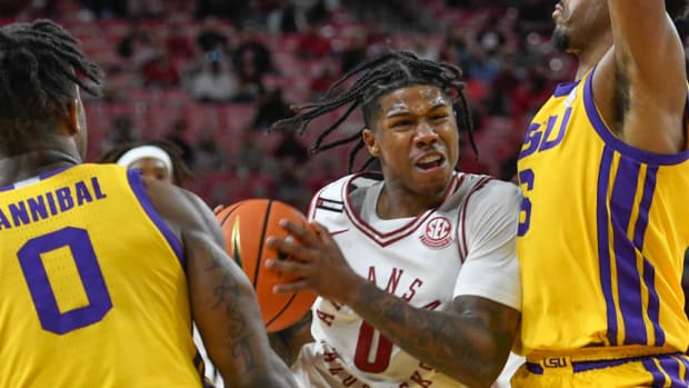 Razorbacks' Khalif Battle drives inside against LSU